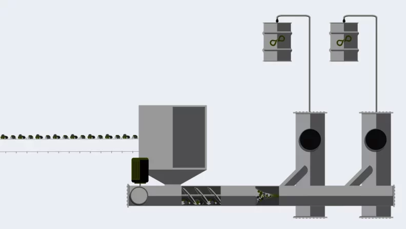 The pre-treated material is fed into the reactor on a conveyor belt.